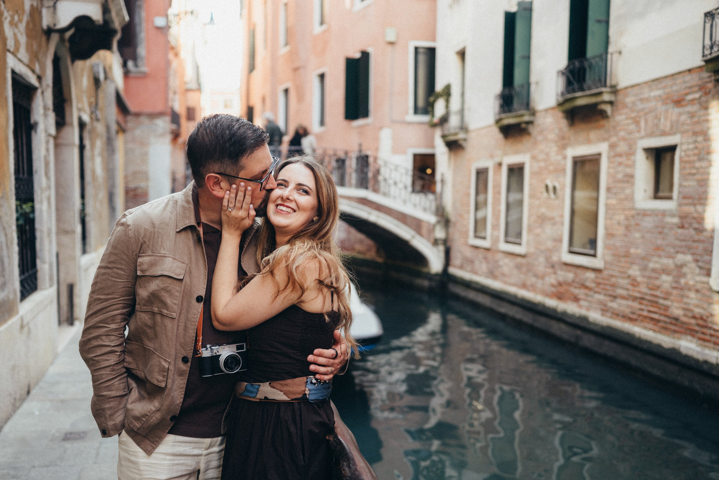 Laughing by a canal
